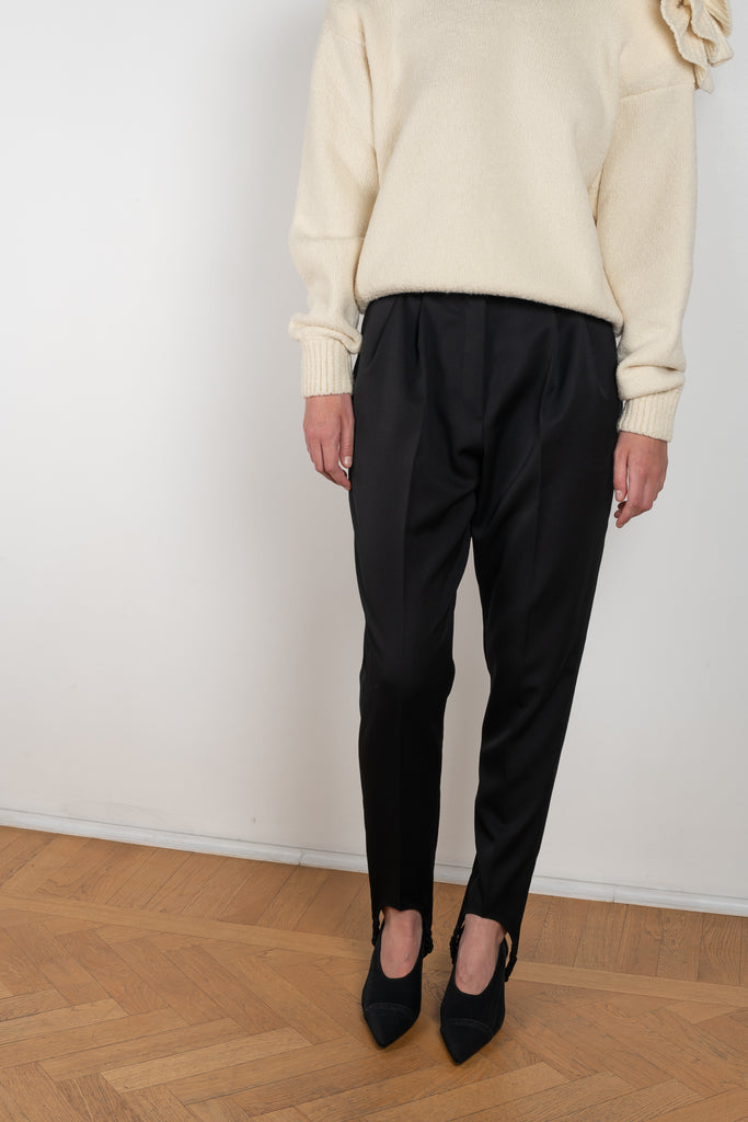 The Wool Stirrup Pants 01 by Magda Butrym is a classic wool skinny trousers with stirrup leg fastenings at the ankle