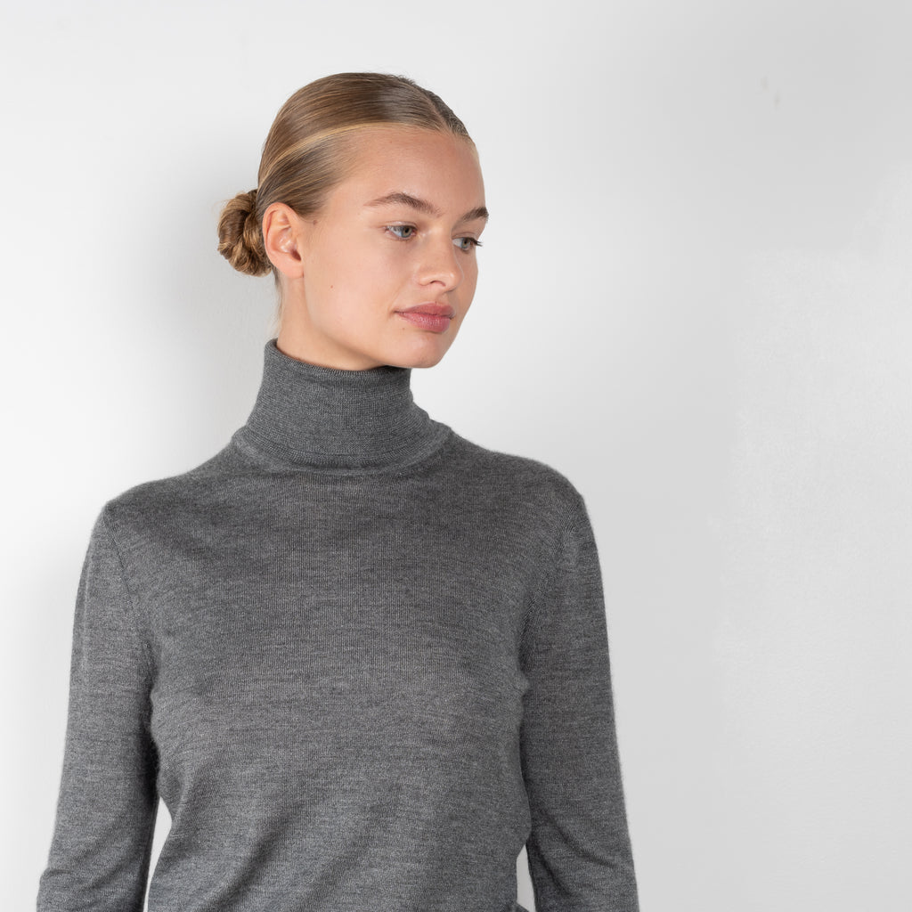 The Cashmere Turtleneck 03 by Magda Butrym is a luxurious cashmere long-sleeve turtleneck, a perfect winter classic to layer