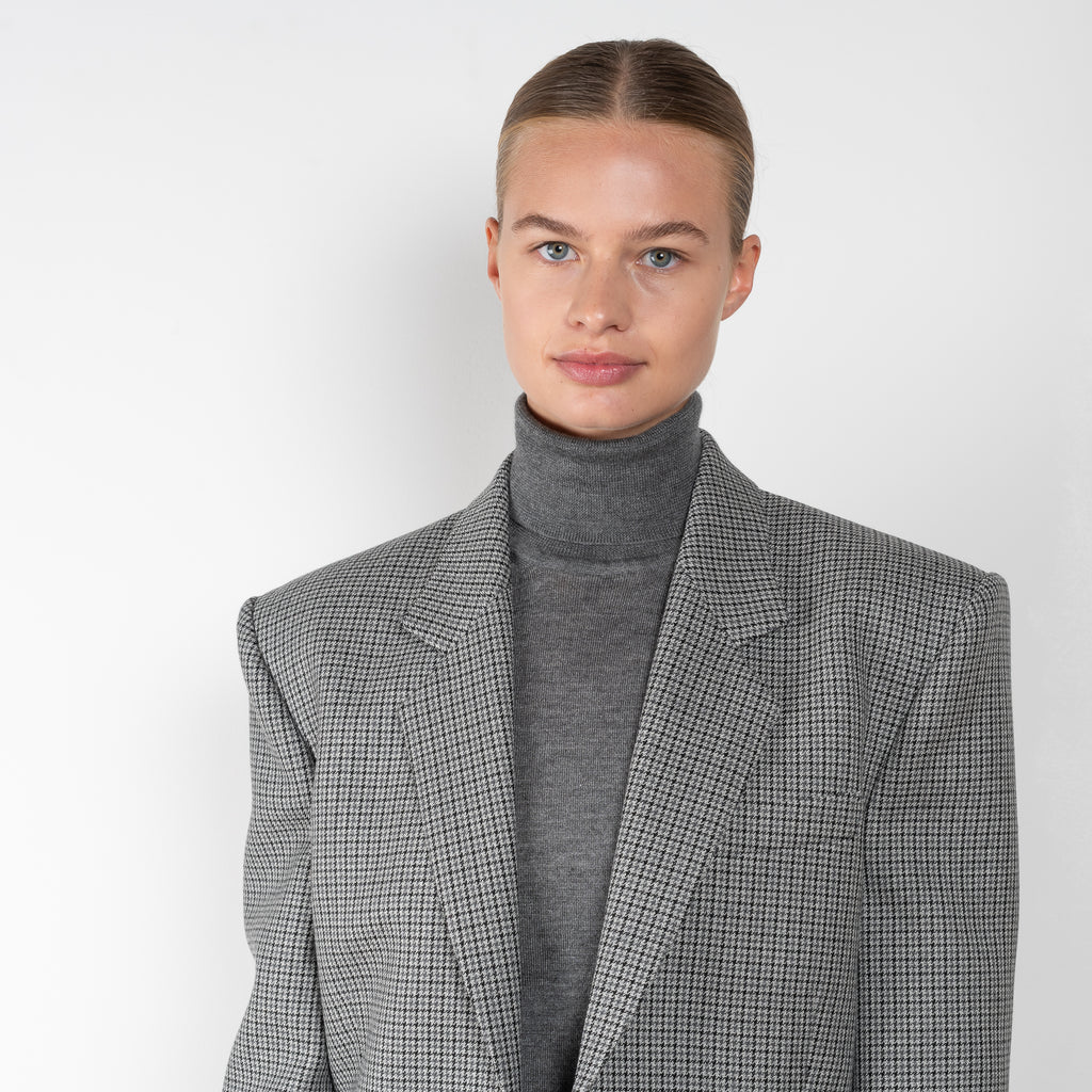 The Cashmere Turtleneck 03 by Magda Butrym is a luxurious cashmere long-sleeve turtleneck, a perfect winter classic to layer