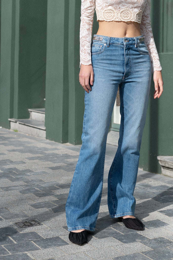 The Embellished Jeans by Paco Rabanne is a straight leg Jeans with embellished discs on the side