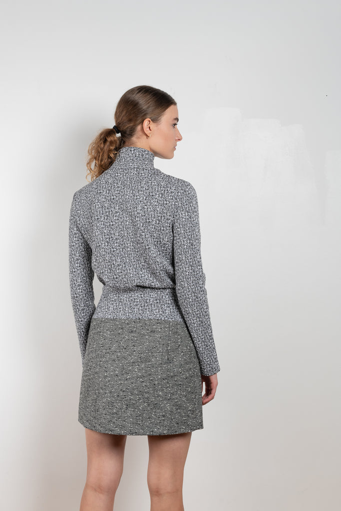 The Grey Wool Skirt by Paco Rabanne is a high waisted mini skirt in a wool bouclette