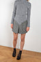 The Grey Wool Skirt by Paco Rabanne is a high waisted mini skirt in a wool bouclette