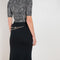 The Wool Chain Skirt by Paco Rabanne is a high waisted midi length skirt with a chain embellished detail