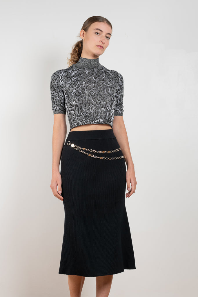 The Wool Chain Skirt by Paco Rabanne is a high waisted midi length skirt with a chain embellished detail