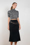 The Wool Chain Skirt by Paco Rabanne is a high waisted midi length skirt with a chain embellished detail