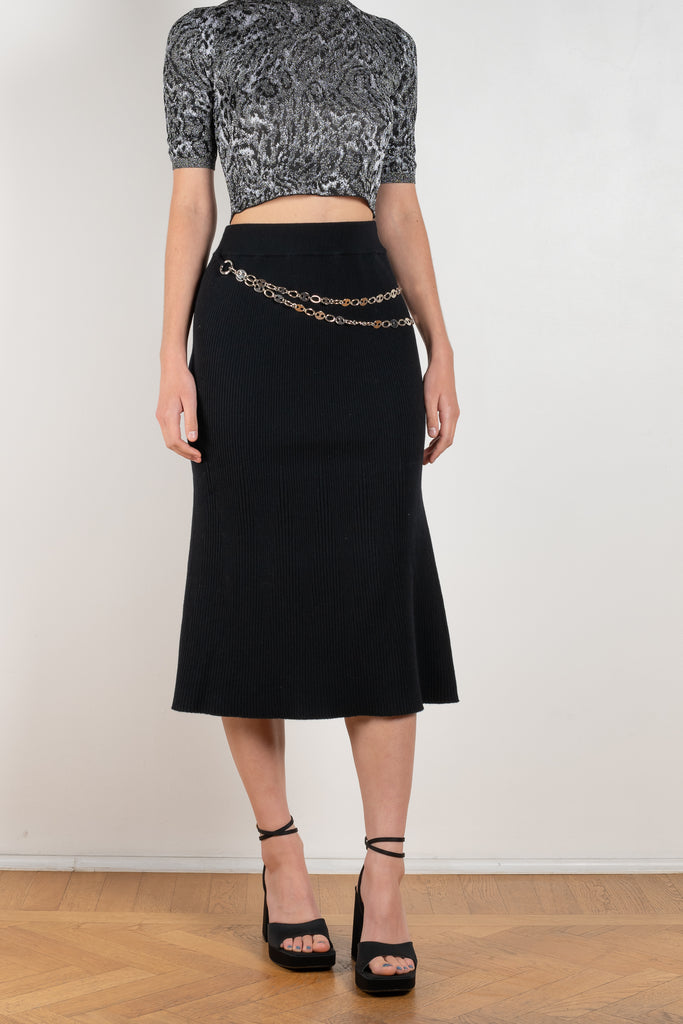 The Wool Chain Skirt by Paco Rabanne is a high waisted midi length skirt with a chain embellished detail