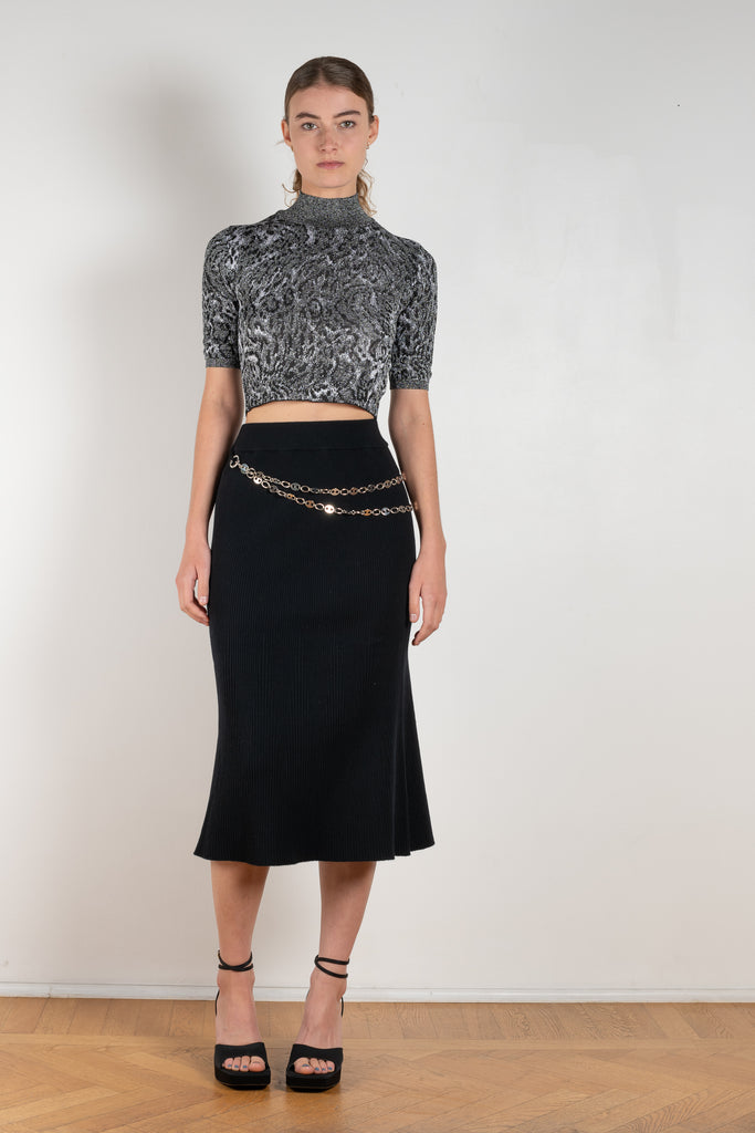 The Wool Chain Skirt by Paco Rabanne is a high waisted midi length skirt with a chain embellished detail