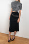 The Wool Chain Skirt by Paco Rabanne is a high waisted midi length skirt with a chain embellished detail