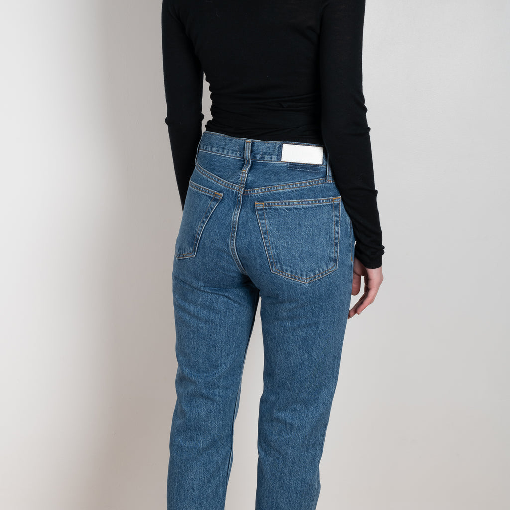 The 70's Stove Pipe Jeans by Redone in color SAF is a signature high rise jeans with a straight ankle length leg in a blue wash