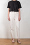 The 70's Stove Pipe Jeans by Redone in color Vintage White is a signature high rise jeans with a straight ankle length leg