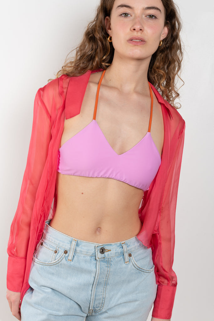 The Ava Bikini Top by Rejina Pyo in bright pink Sakura is a perfect layering piece for all your summer outfits