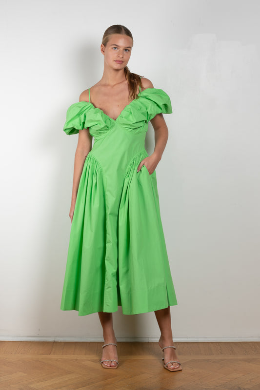 The Erin Dress by Rejina Pyo is an off-the-shoulder dress with puffed sleeves from this Fall's runway