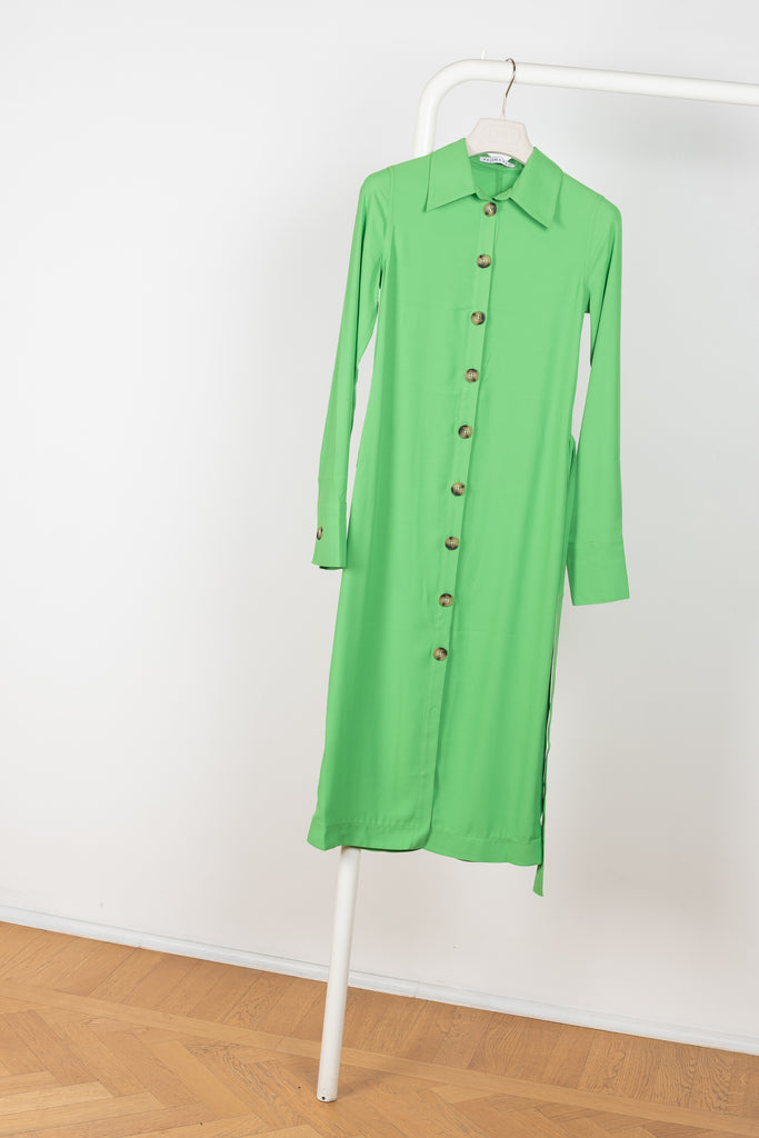 The Estelle Dress by Rejina Pyo is a fluid shirtdress with a relaxed drape and a detachable matching belt