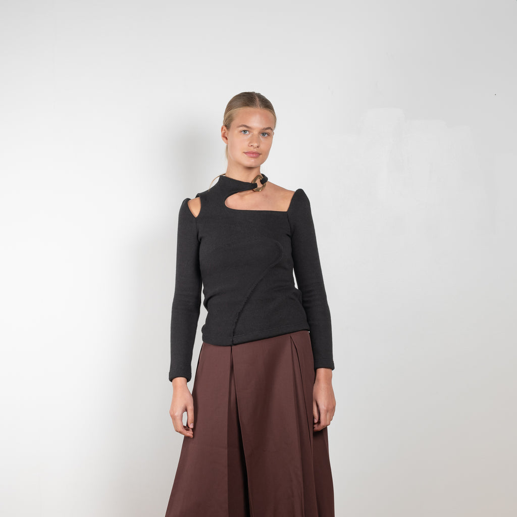 The Malia Skirt by Rejina Pyo is a high waisted a-line skirt with pleats in a fluid wool blend