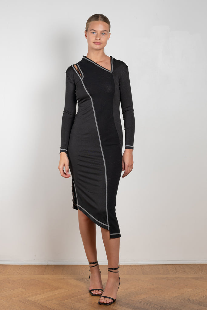 The Mavis Dress by Rejina Pyo is close to the body dress with a shoulder cut-out and contrast stitch detailing