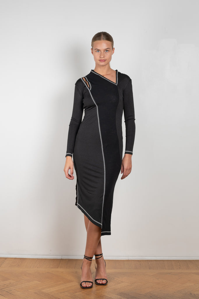 The Mavis Dress by Rejina Pyo is close to the body dress with a shoulder cut-out and contrast stitch detailing