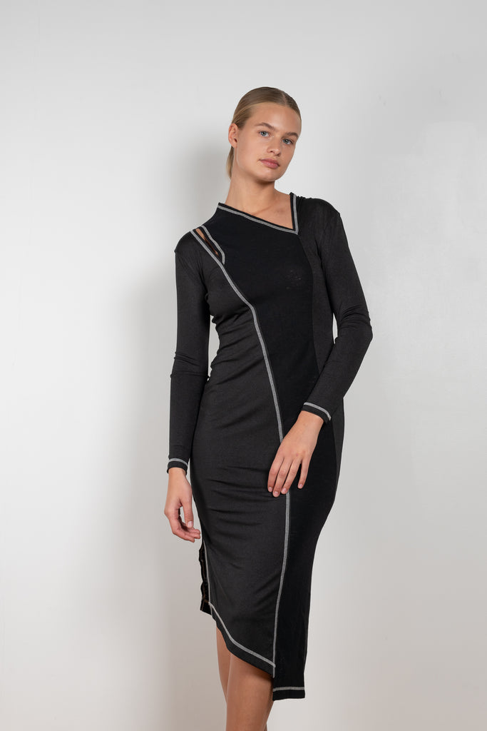 The Mavis Dress by Rejina Pyo is close to the body dress with a shoulder cut-out and contrast stitch detailing