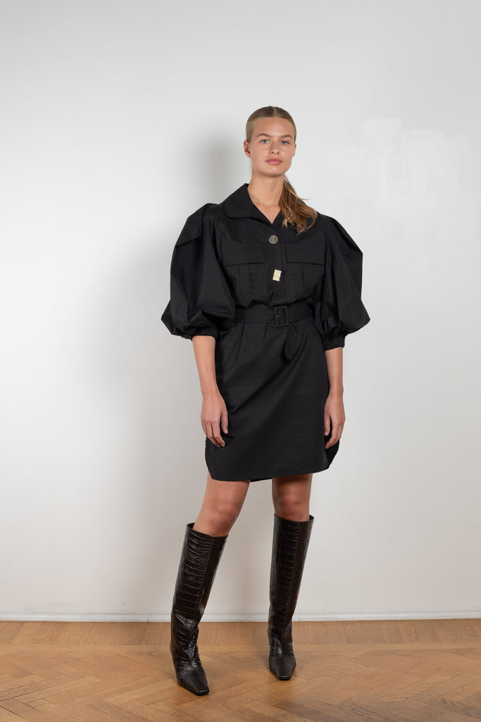 The Paola Dress by Rejina Pyo is a relaxed short belted dress in a crisp cotton with signature buttons