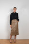 The Riley Skirt by Rejina Pyo is a high waisted pencil skirt with a front slit in a snakeskin faux leather