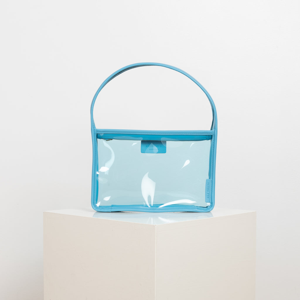 The Mini Lois Bag by Rejina Pyo is a transparent rectangular mini-bag that can carry all your essentials