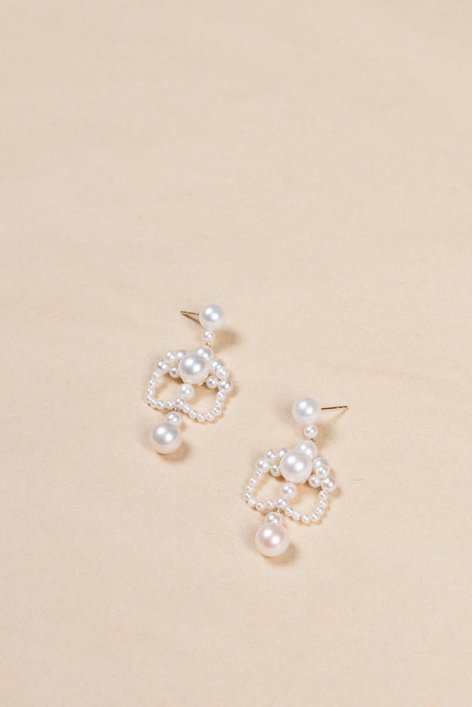 The Grand Chateau de Perles Earrings by Sophie Bille Brahe are a majestic pair of chandelier-style earrings, channelled through Sophie's modern minimalism