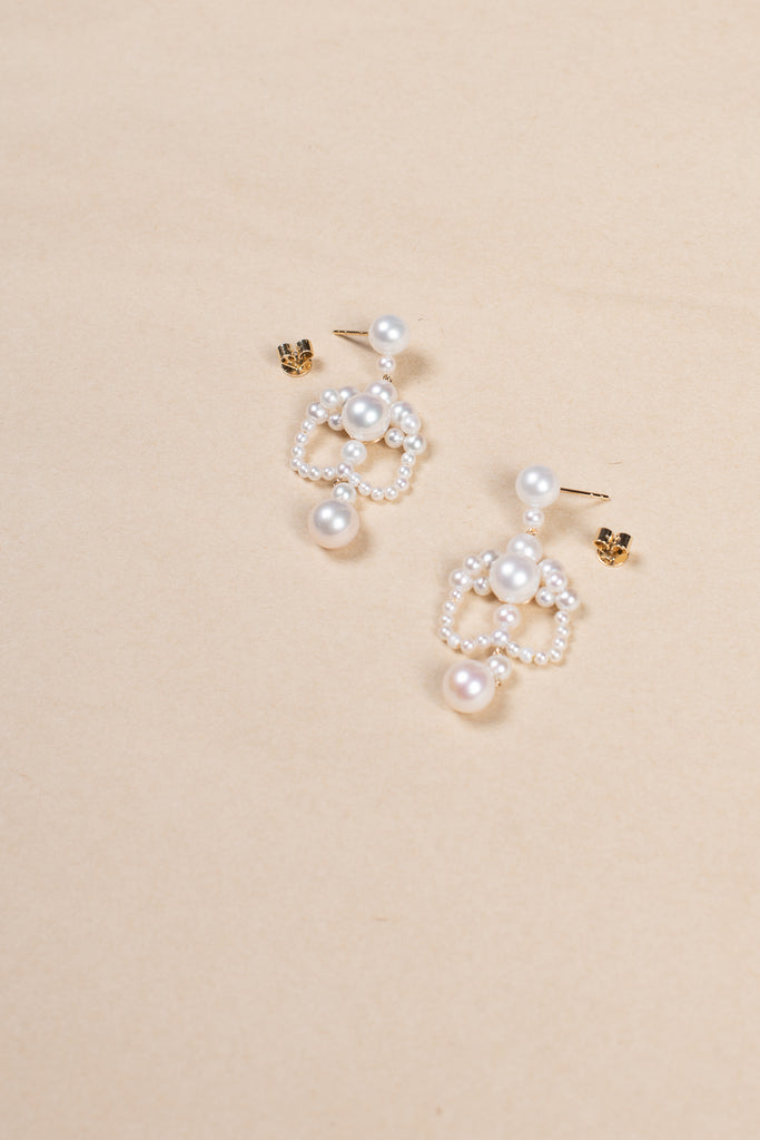 The Grand Chateau de Perles Earrings by Sophie Bille Brahe are a majestic pair of chandelier-style earrings, channelled through Sophie's modern minimalism