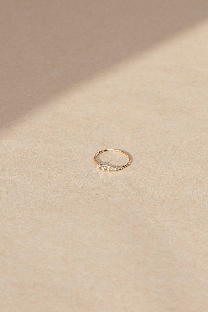 The Pleine De Lune Grand Ring by Sophie Bille Brahe is a delicate ring in 18K yellow gold with a total of 0,19ct Top Wesselton VVS diamonds in graduating sizes