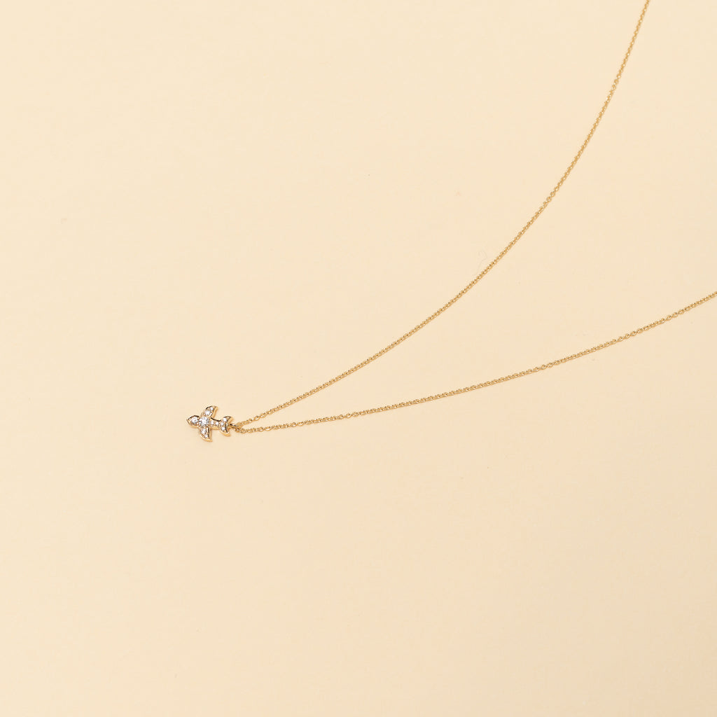 The Petite Matisse Necklace by Sophie Bille Brahe is a fine 18Kt Gold necklace with diamonds set in a dove shaped charm inspired by the artist Henri Matisse