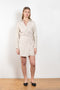 The Fiona Dress by Xirena is a soft linen tie wrap mini dress